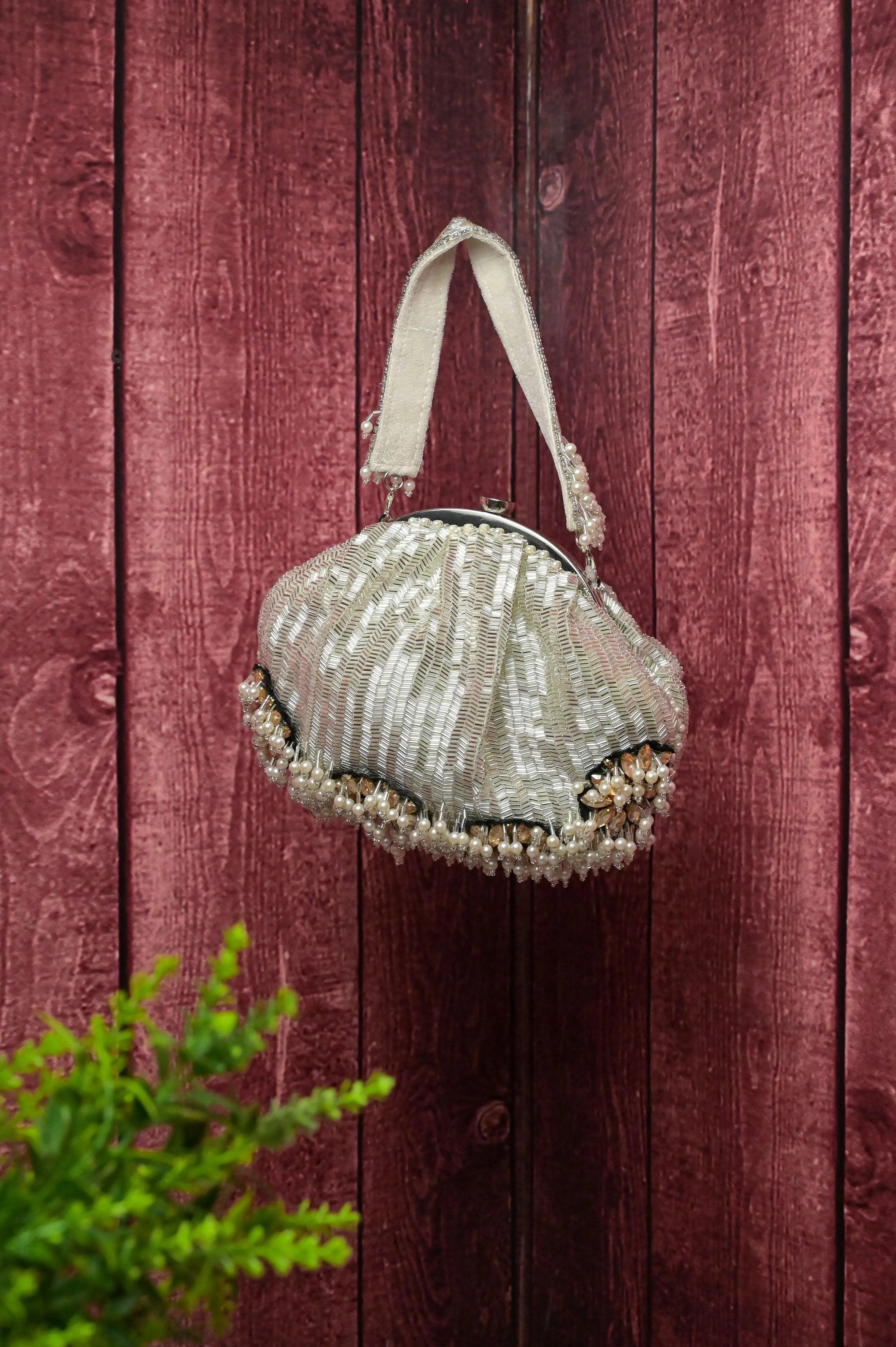 White Designer Handbag Woven with Styling Pipes and Pearls